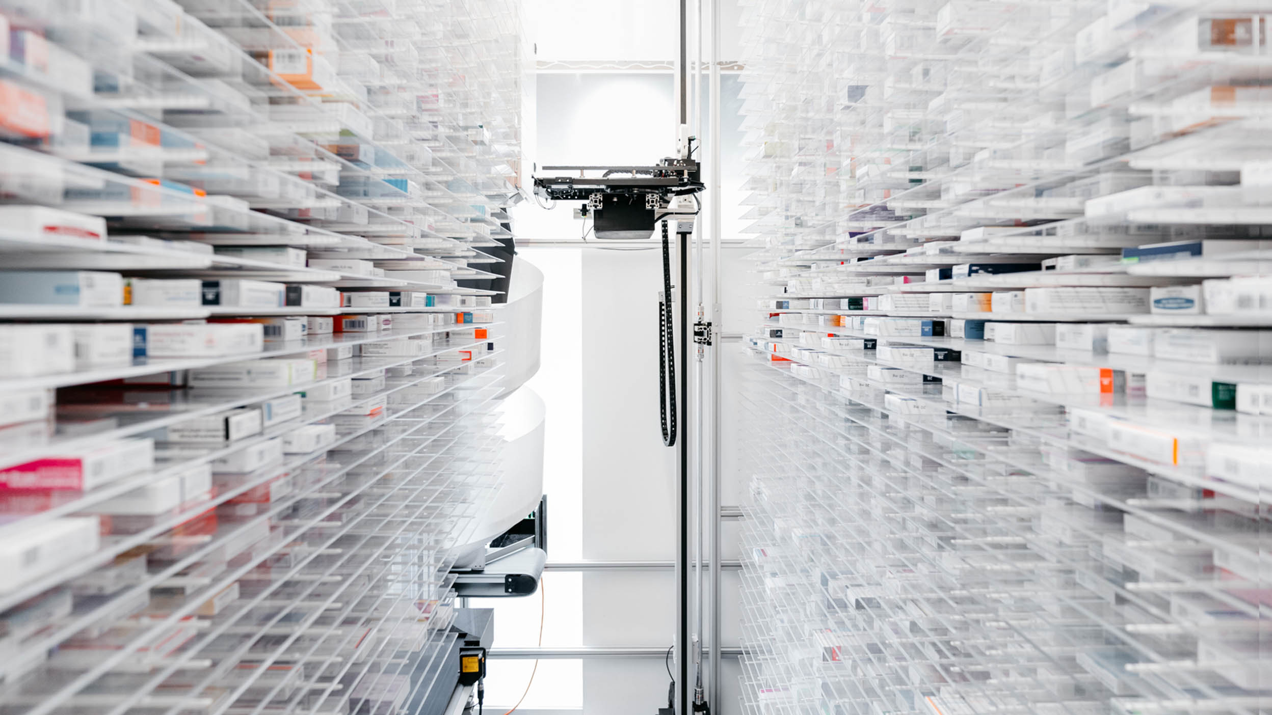 A robot at work in a pharmacy illustrates one way the innovative companies that make up the holdings of Invesco QQQ ETF are shaping the future.