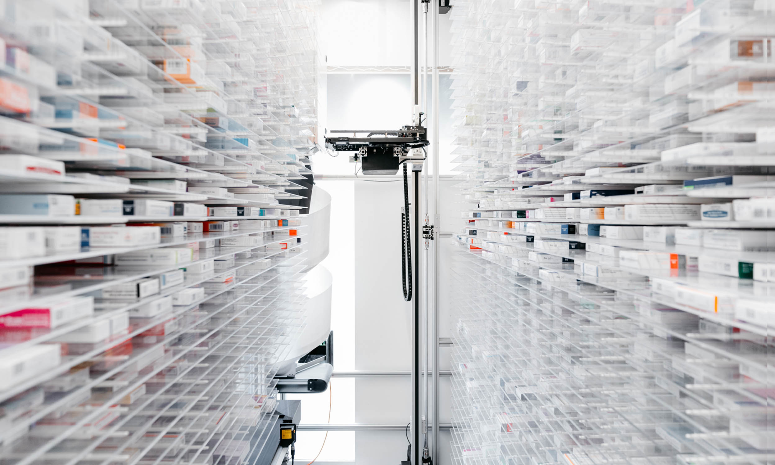 A robot at work in a pharmacy illustrates one way the innovative companies that make up the holdings of Invesco QQQ ETF are shaping the future.