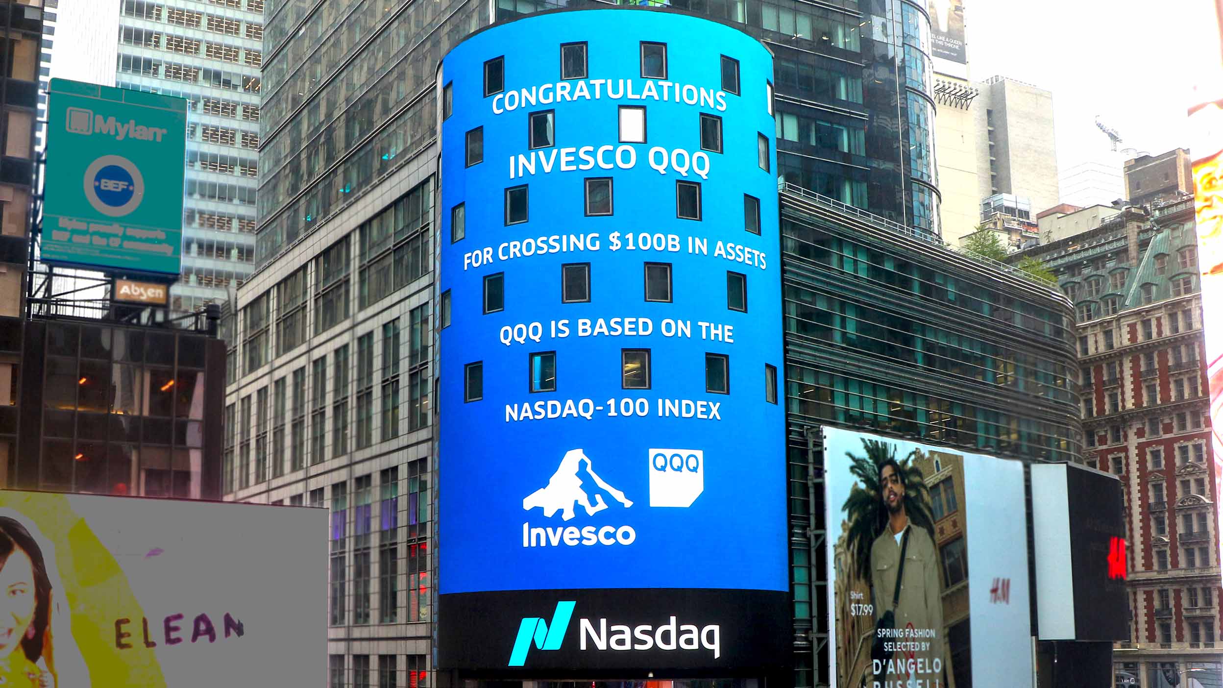 Invesco QQQ billboard celebrating milestone of going over $100b in assets