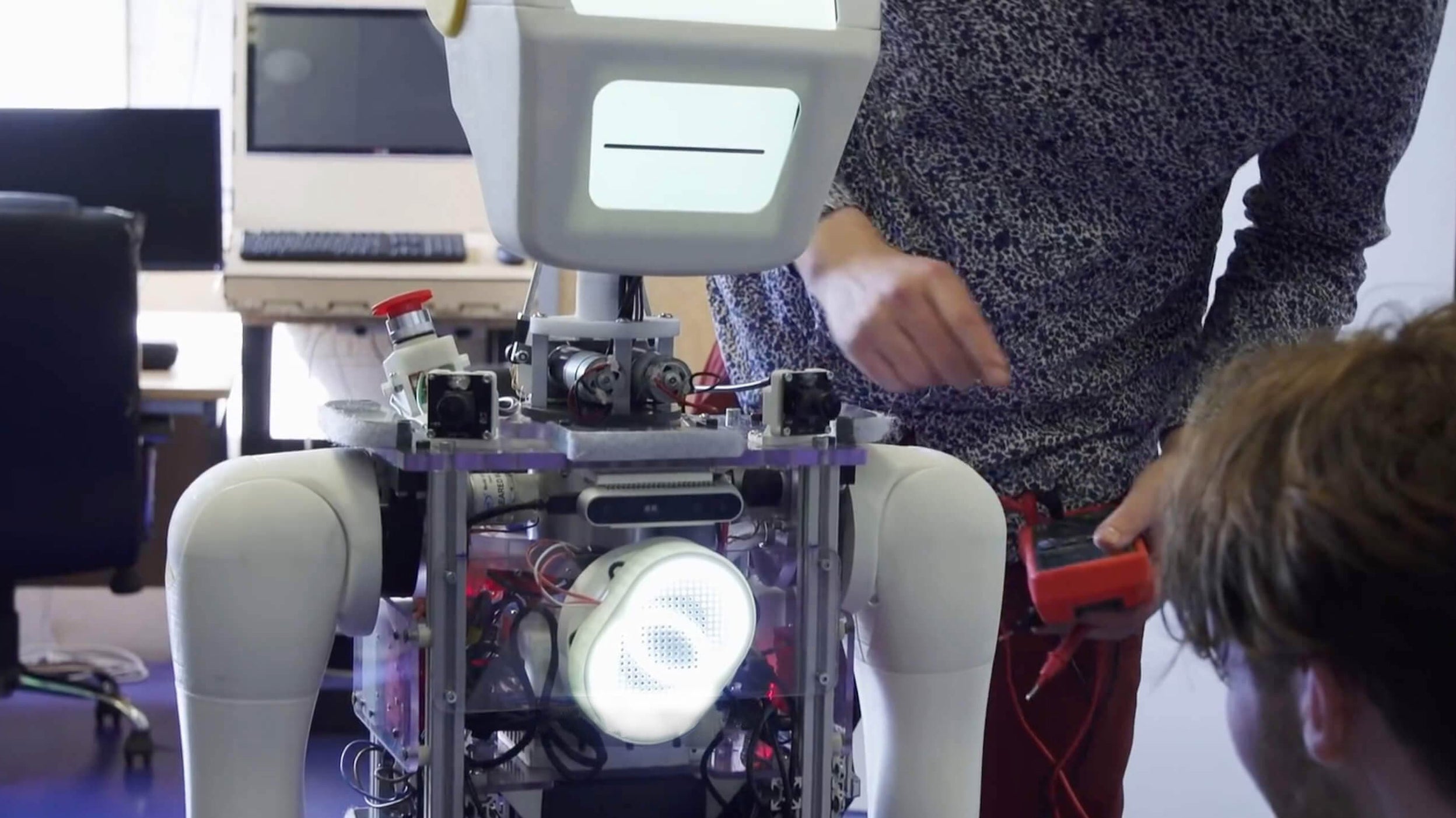 Engineers running tests on the Stevie robot, developed by Akara Robotics and featured in Invesco QQQ's Innovation Now series