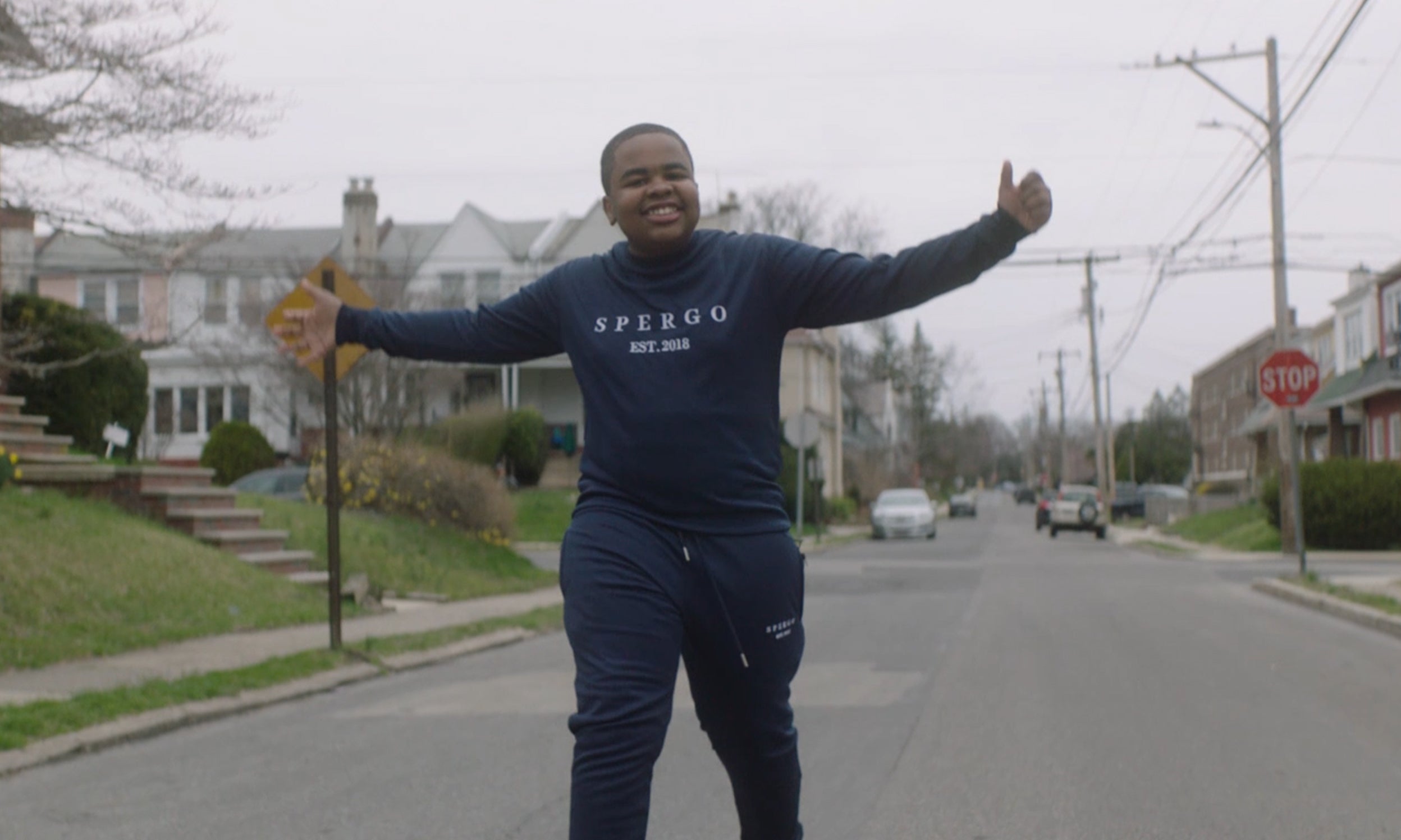 Trey Brown of fashion company Spergo on a neighborhood street. Spergo is featured in Invesco QQQ's Innovation Now series.