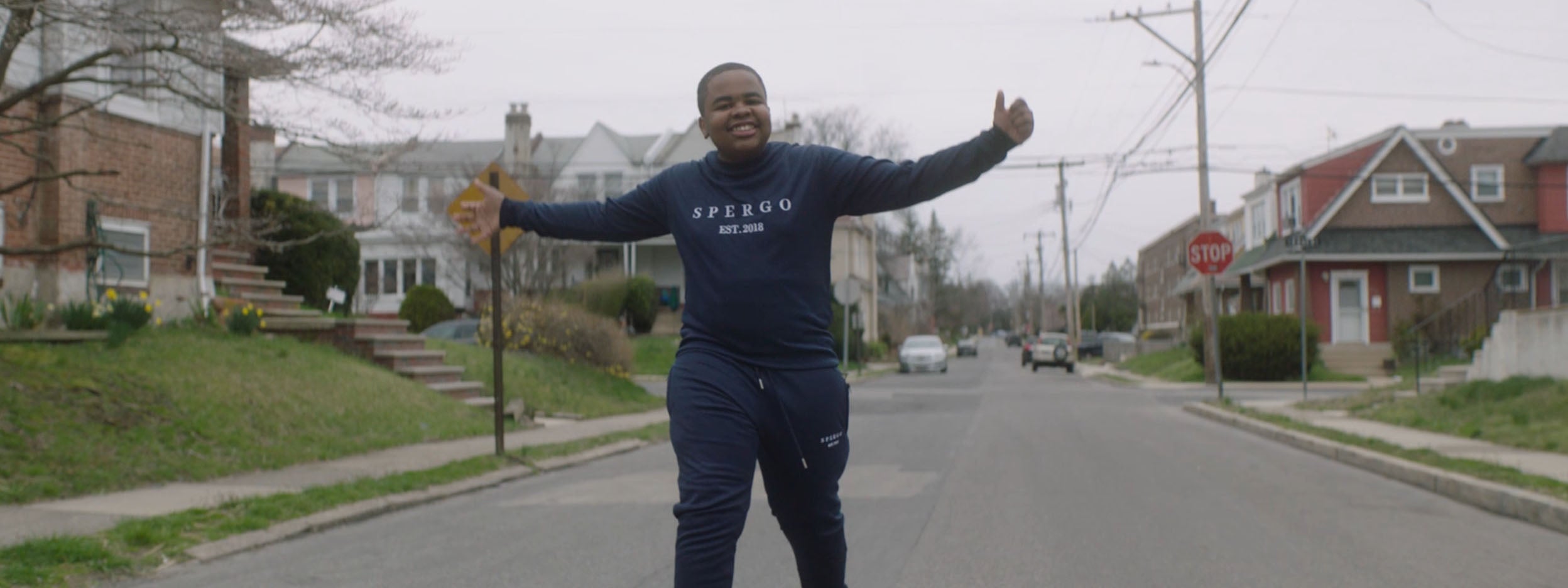 Trey Brown of fashion company Spergo on a neighborhood street. Spergo is featured in Invesco QQQ's Innovation Now series.