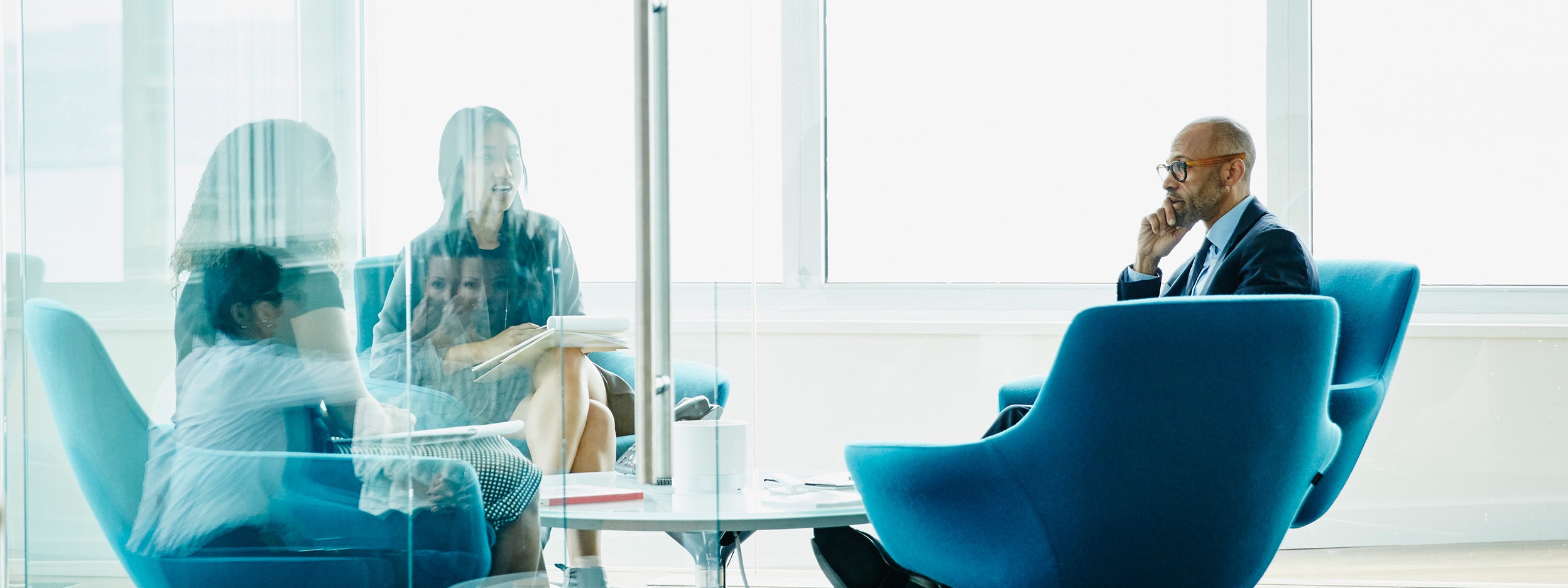 Man participating in a meeting