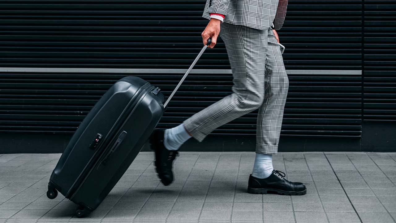 Rolling Suitcase Man