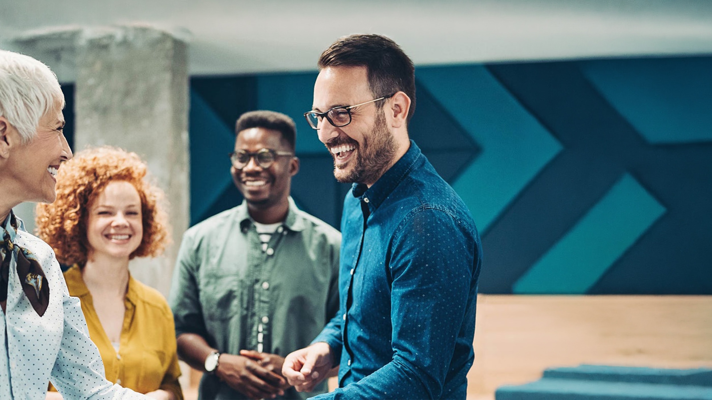 Smiling business persons shaking hands