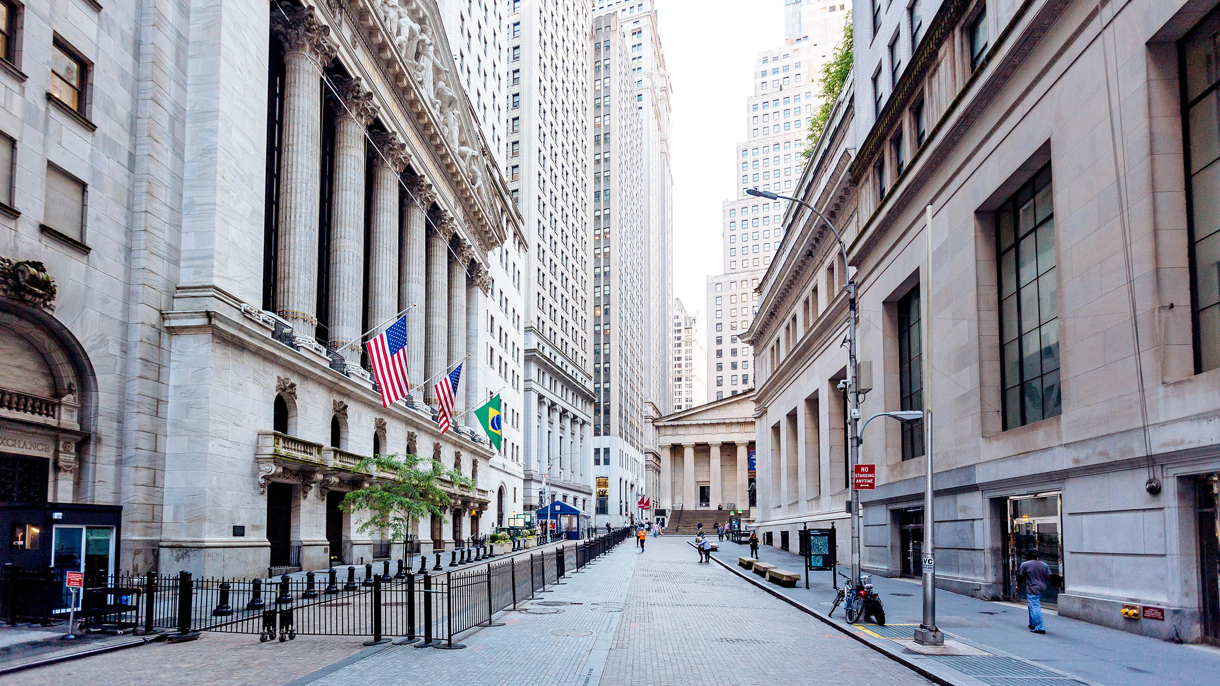 US street with huge buildings.