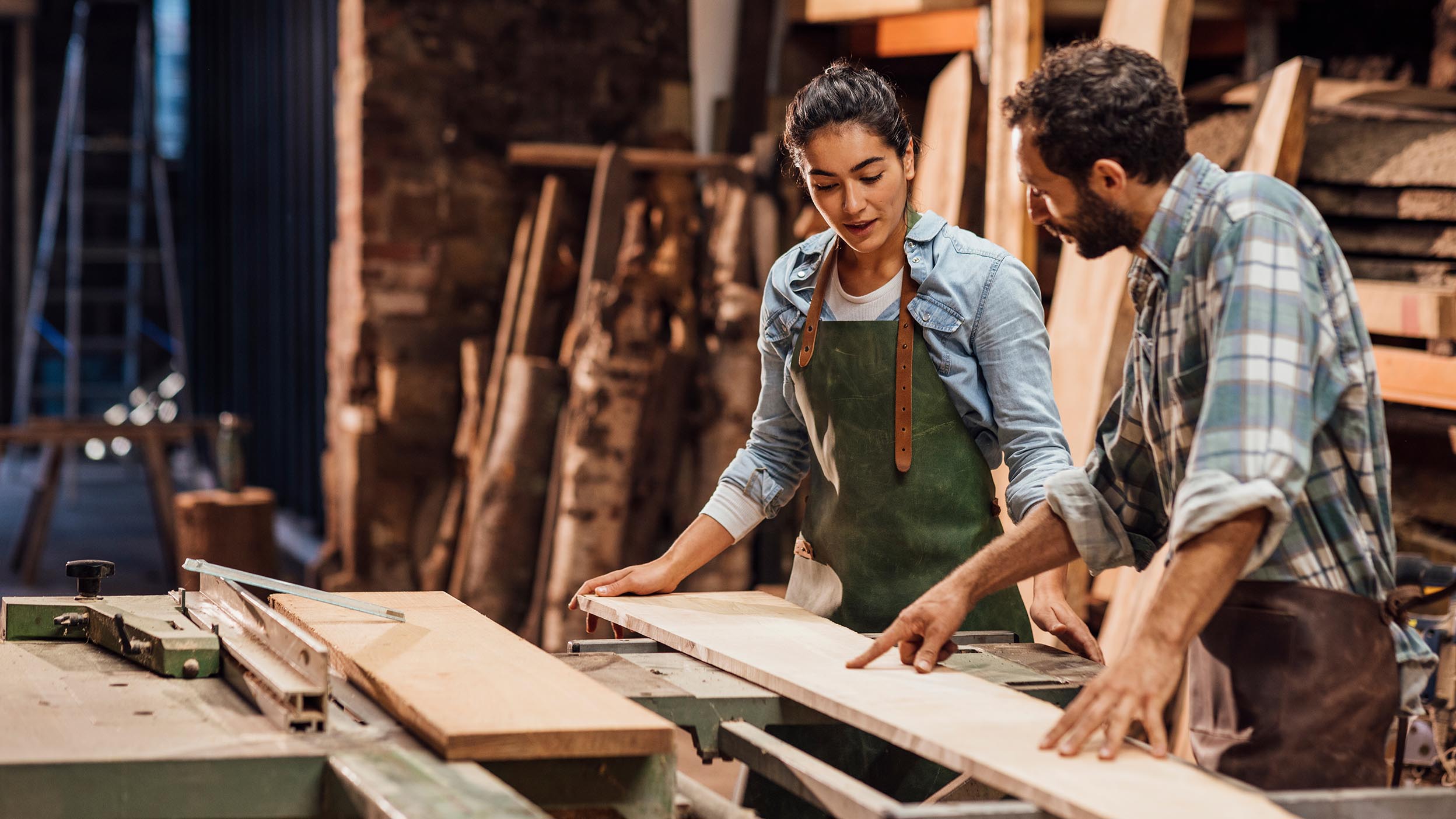 People working in a wood factory