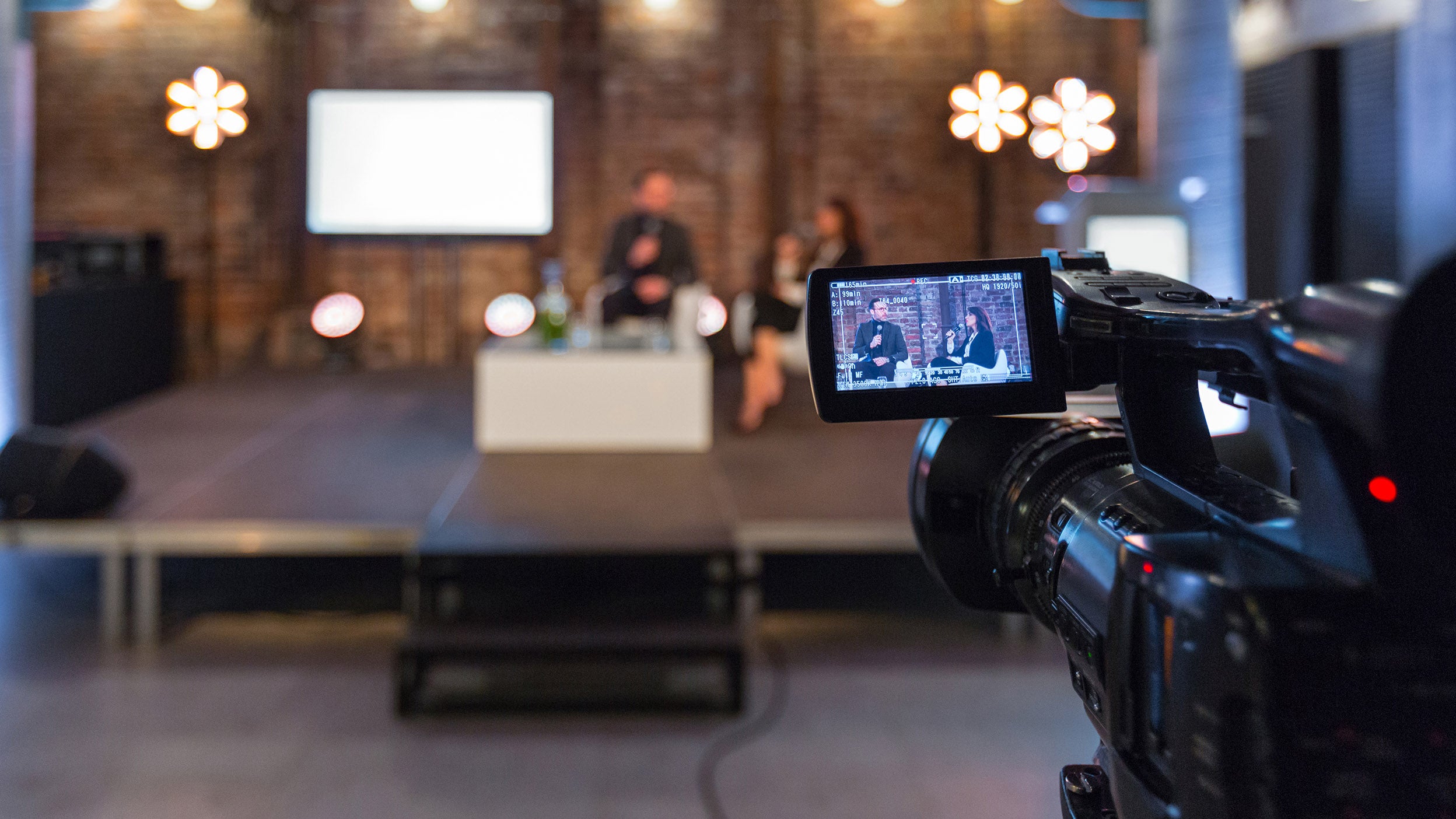 camera filming interview