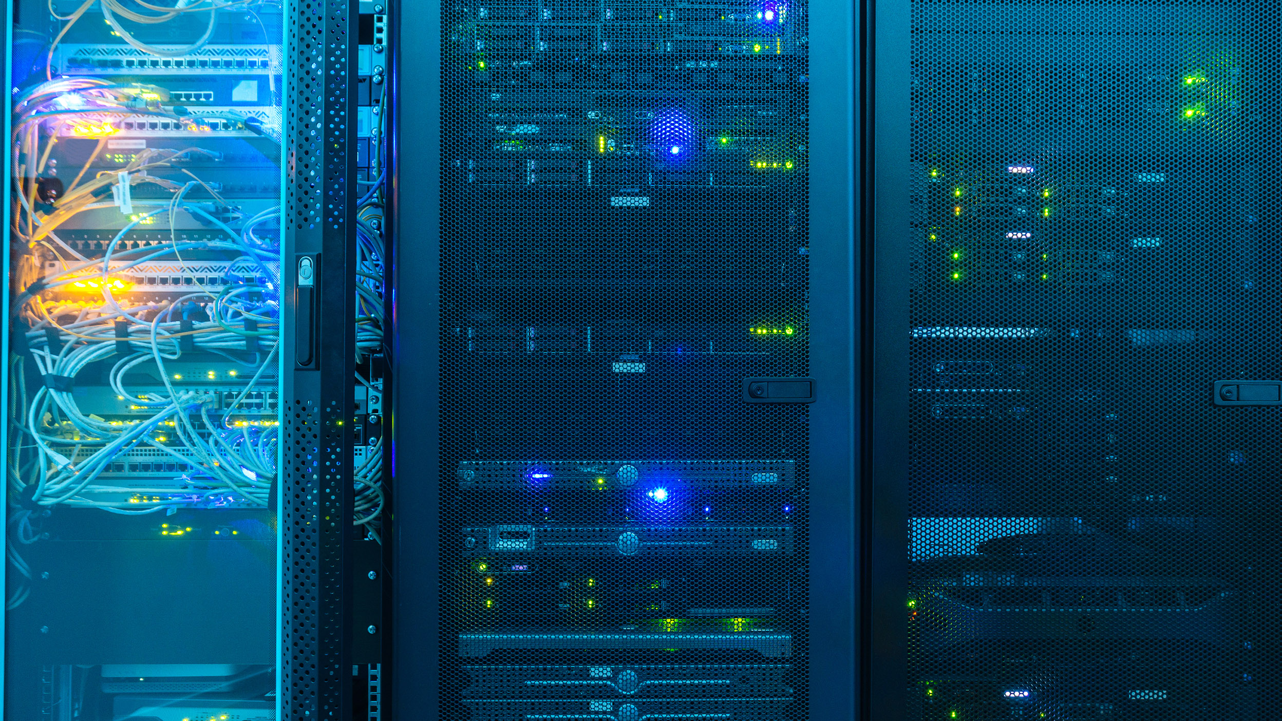 Closeup of servers lit up.