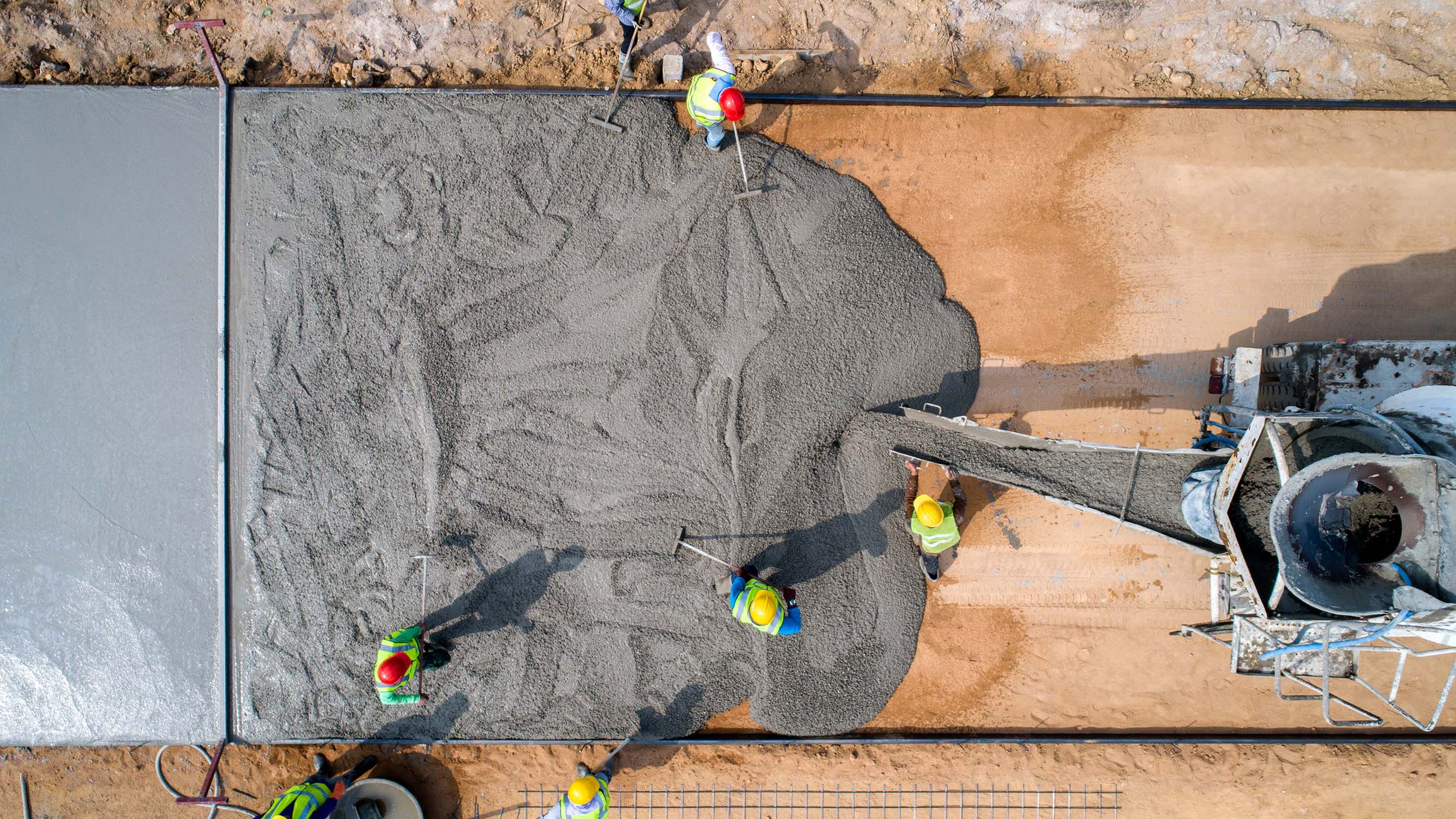 Workers laying a road
