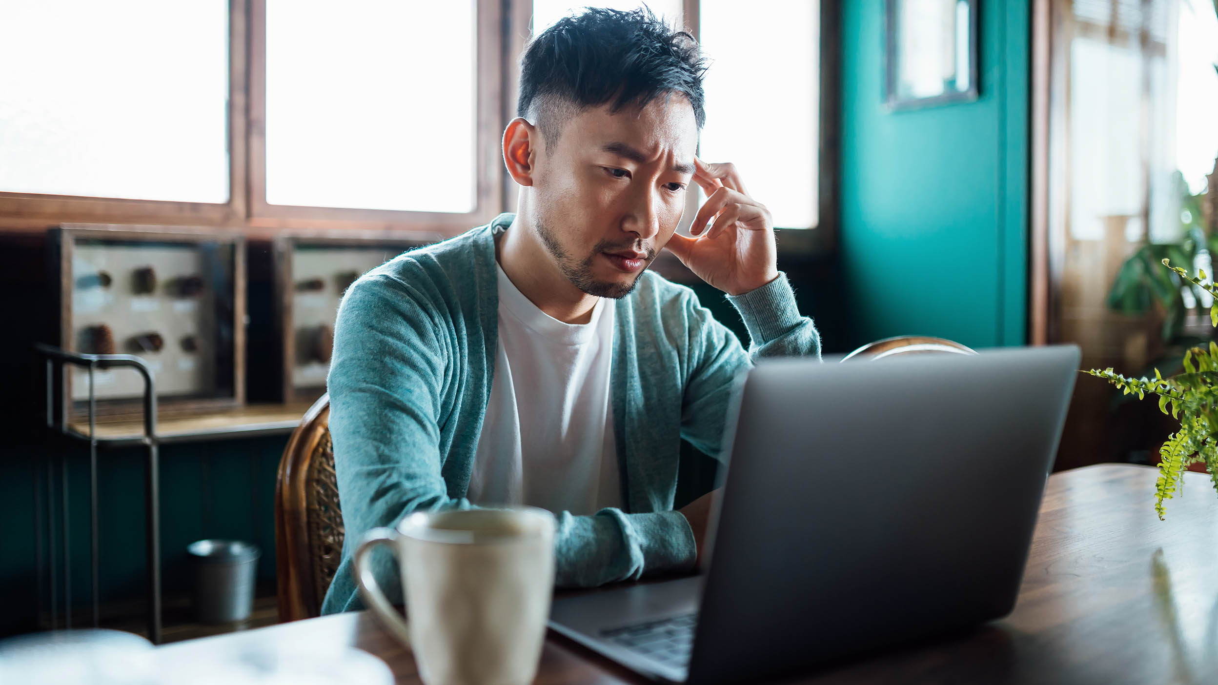 A person staring at his laptop 