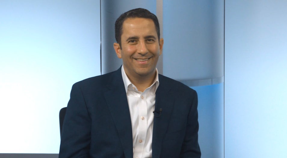 A person talking in a podcast show.