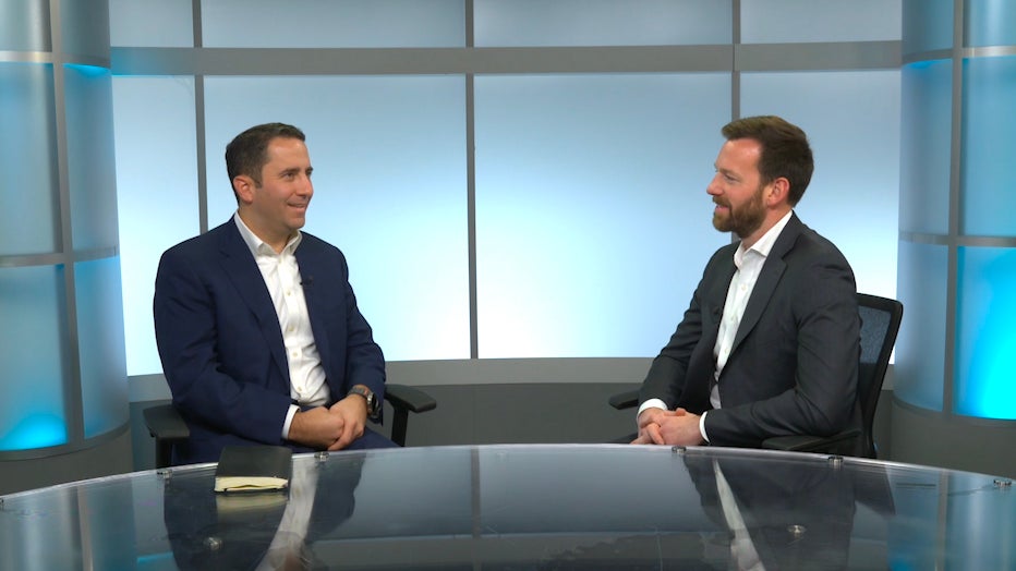 A person talking in a podcast show.