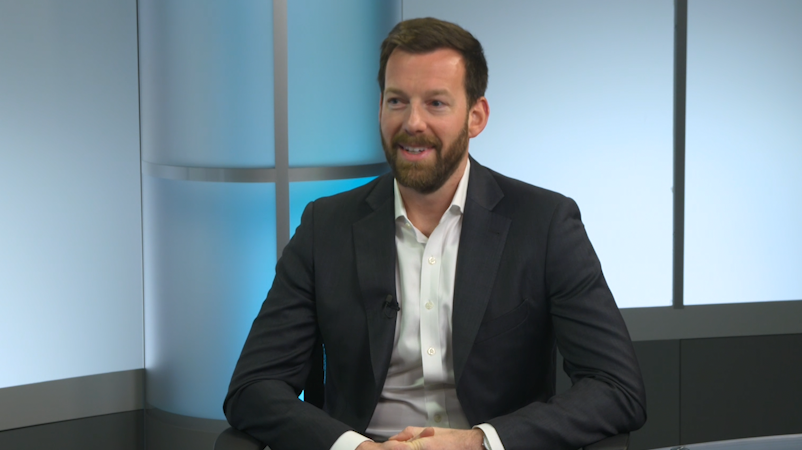 A person talking in a podcast show.