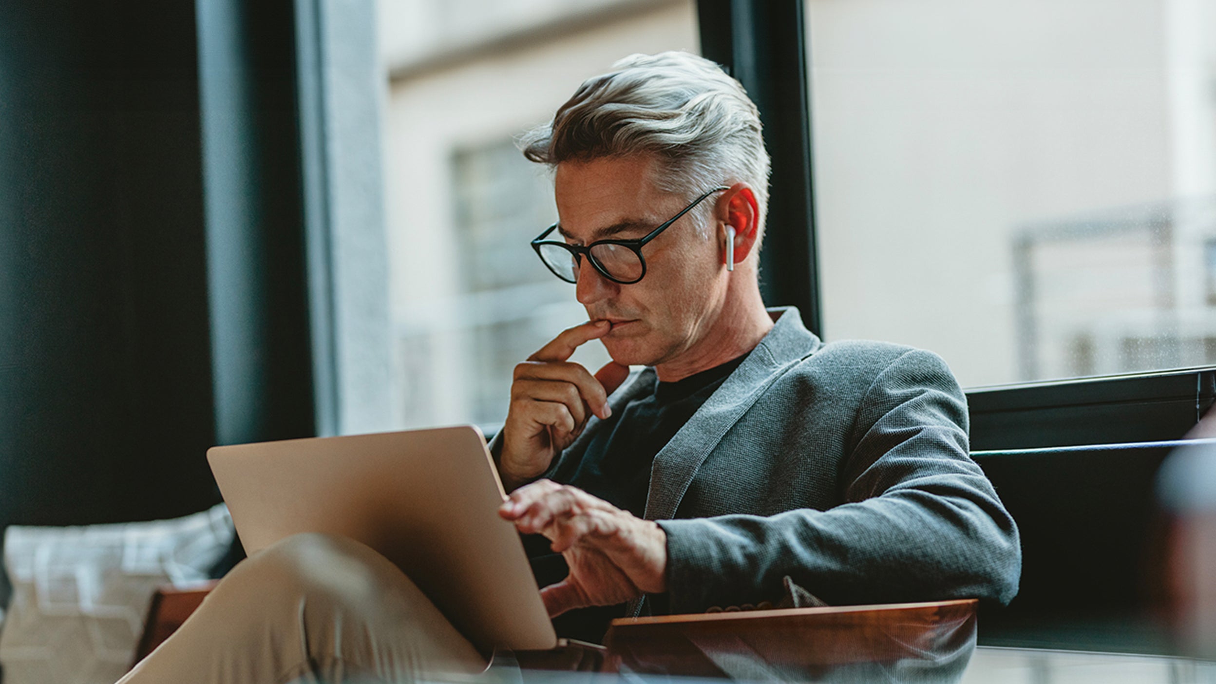 Person looking at his laptop