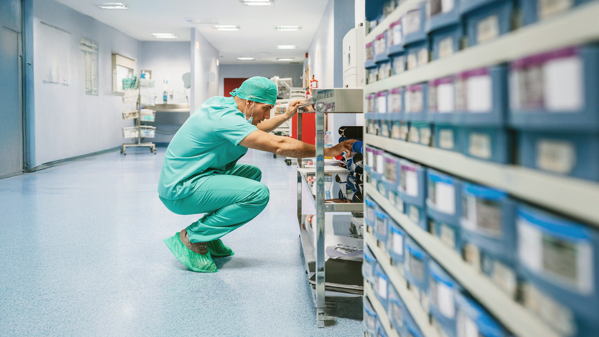 doctor looking in a medical aisle