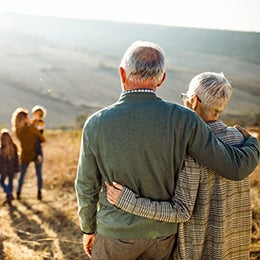 Senior couple looking over the wilderness 