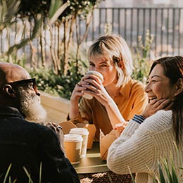 Three%20people%20having%20a%20conversation