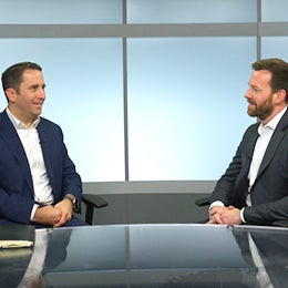 A%20person%20talking%20in%20a%20podcast%20show.