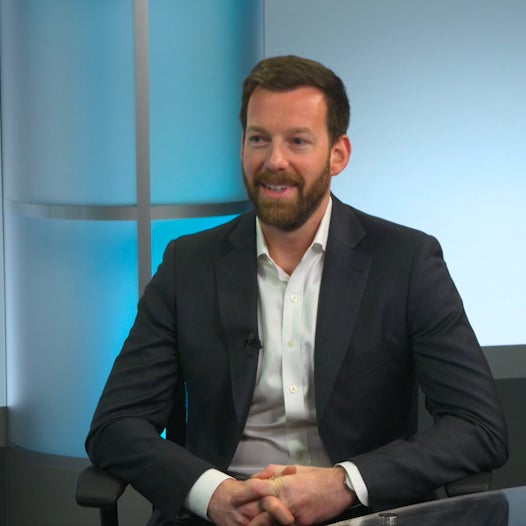 A%20person%20talking%20in%20a%20podcast%20show.