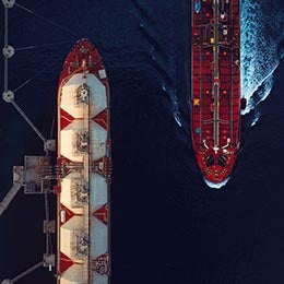 two%20cargo%20ships%20passing%20eachother