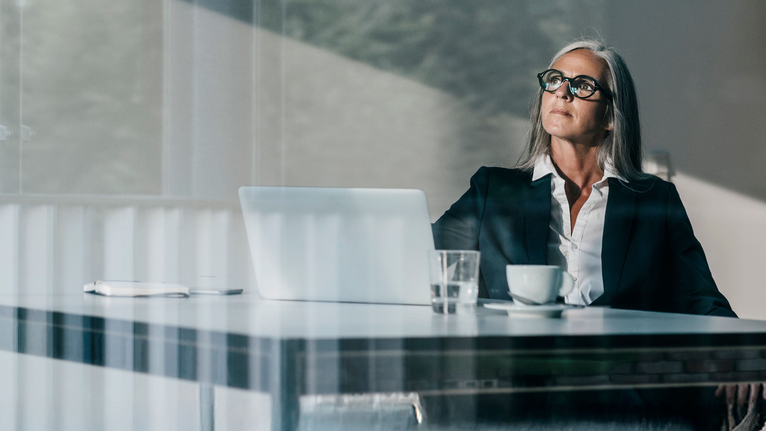A woman sitting in the meeting room