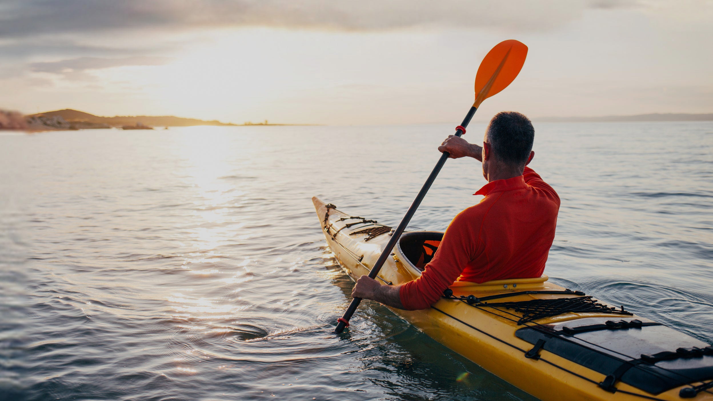 Man kayaking in a river