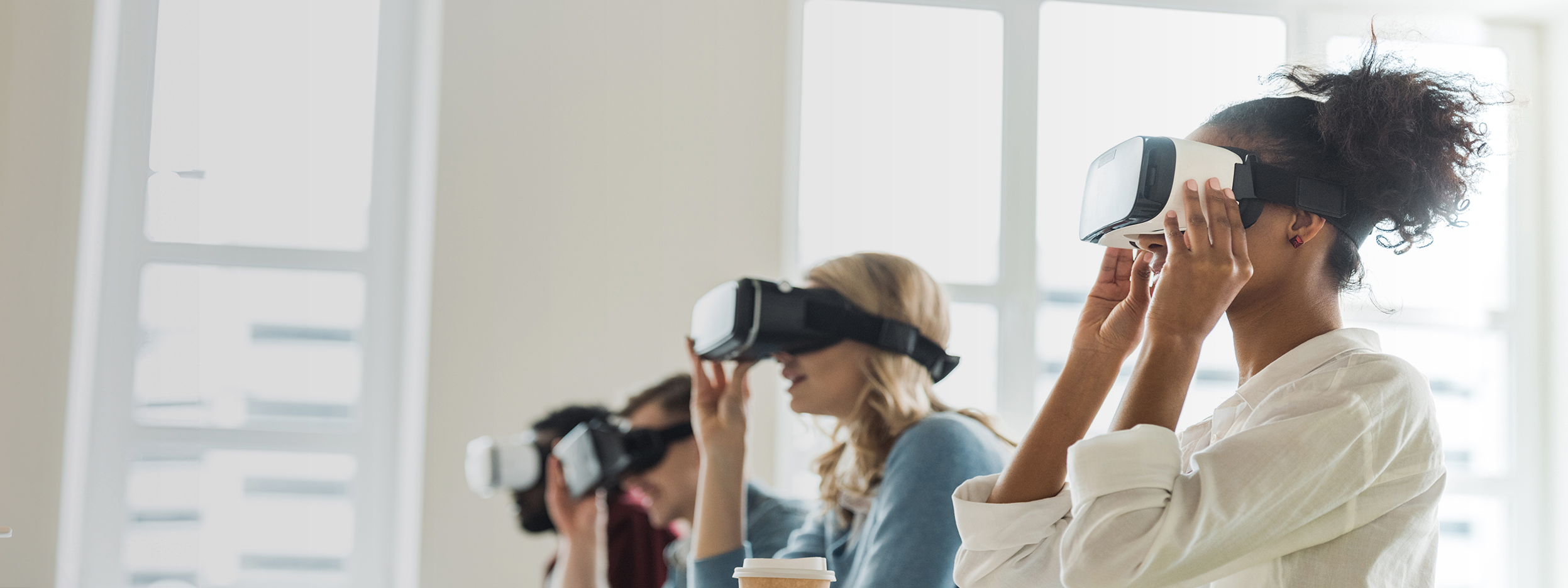 People wearing virtual reality headsets while participating in an interactive training