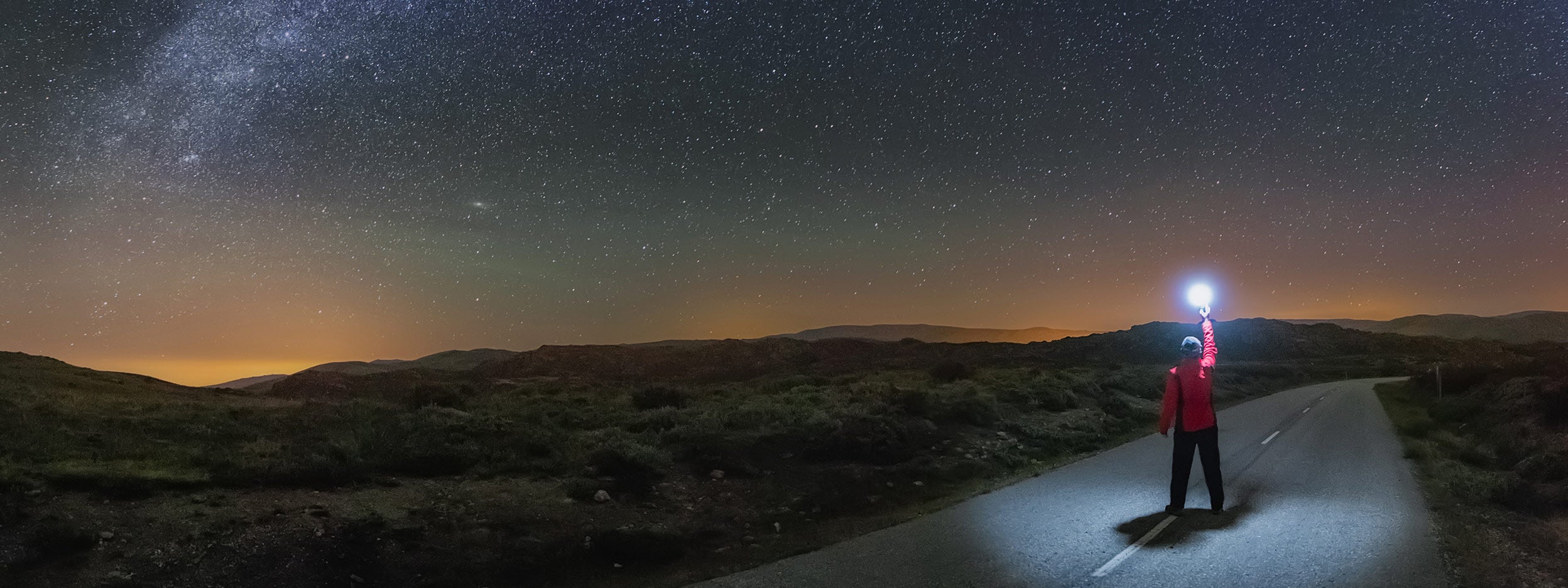 Man looking to the galaxy