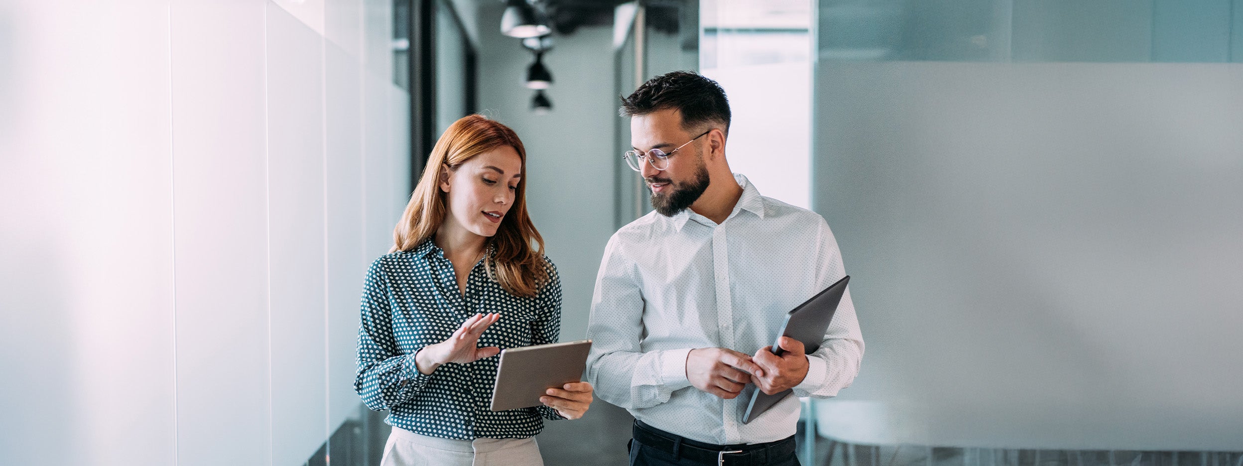 Employees talking in office