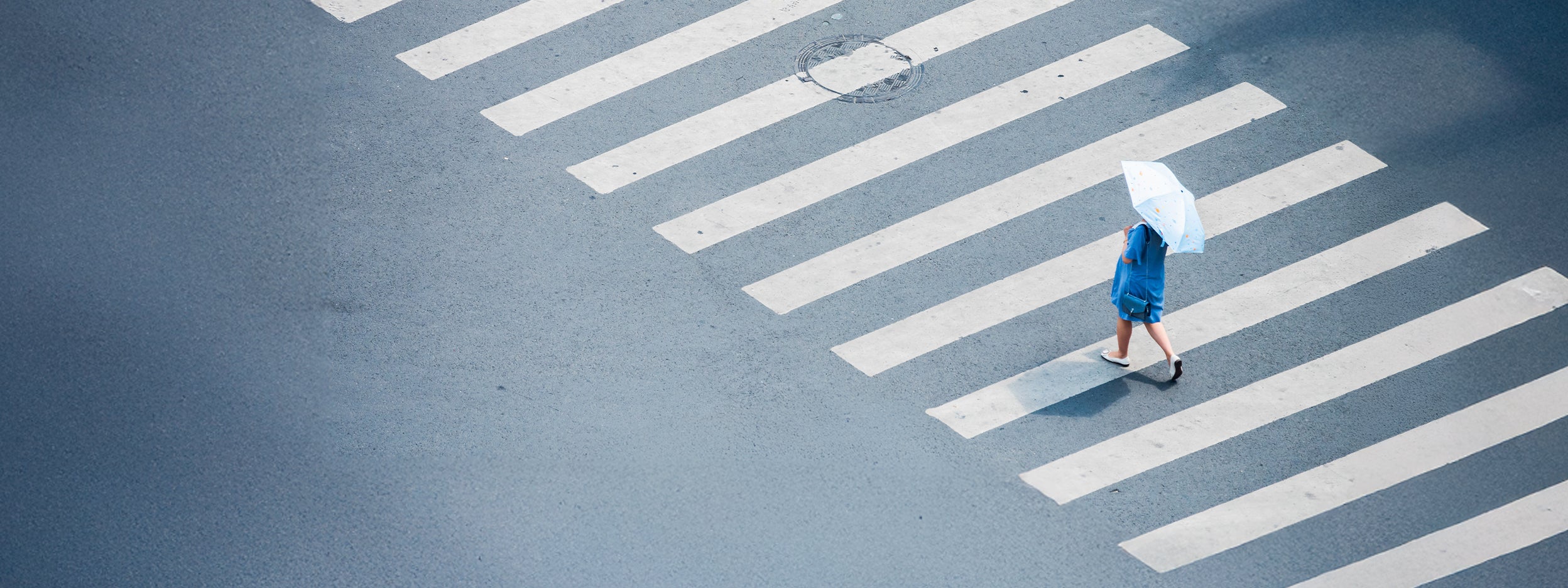 Women crossing road on zebra crossing
