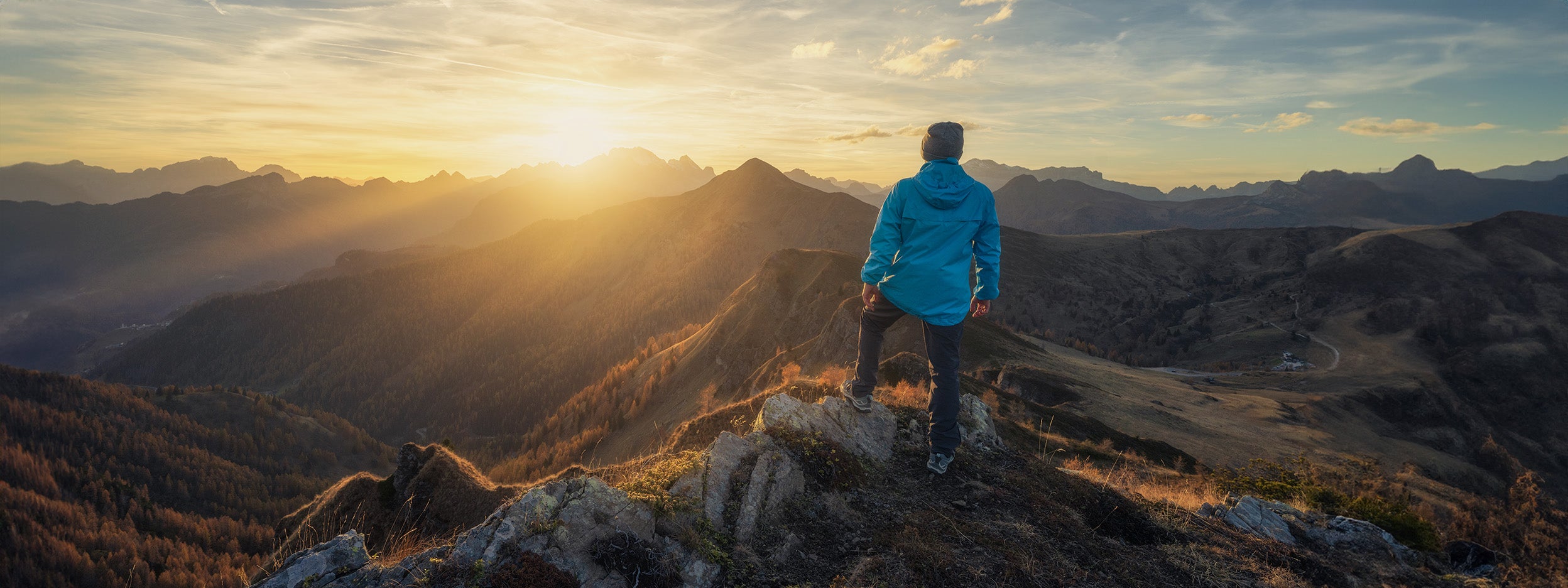 Man at the top of the mountain