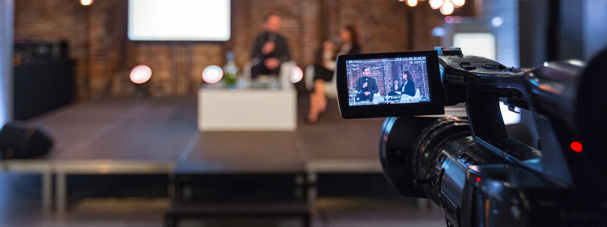 point of view of cameraman while filming an event