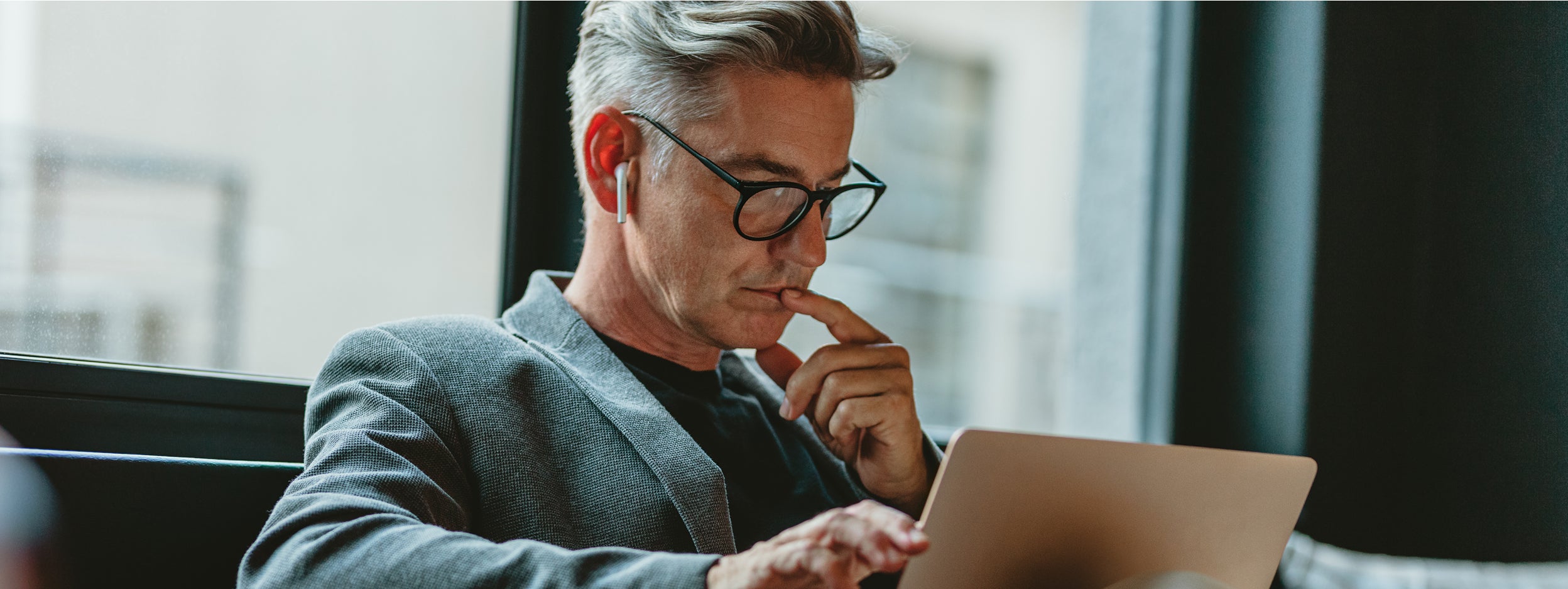 Person looking at his laptop