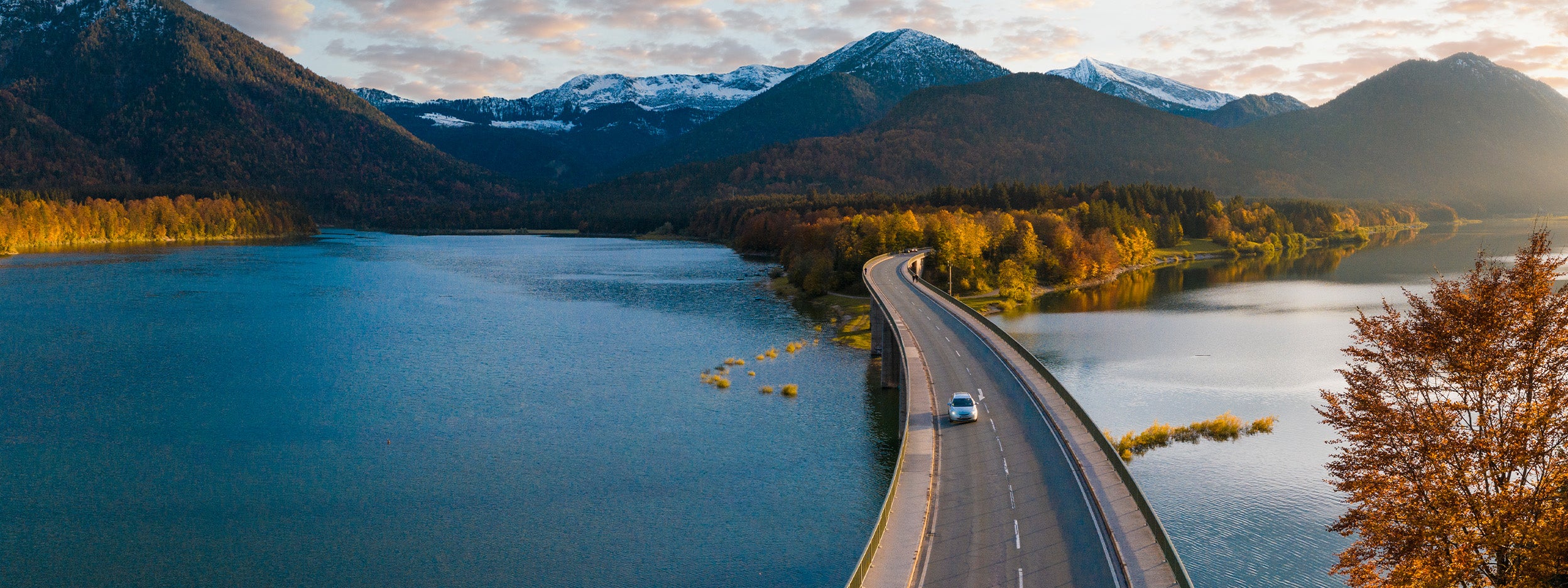 Aerial view of road and a lake