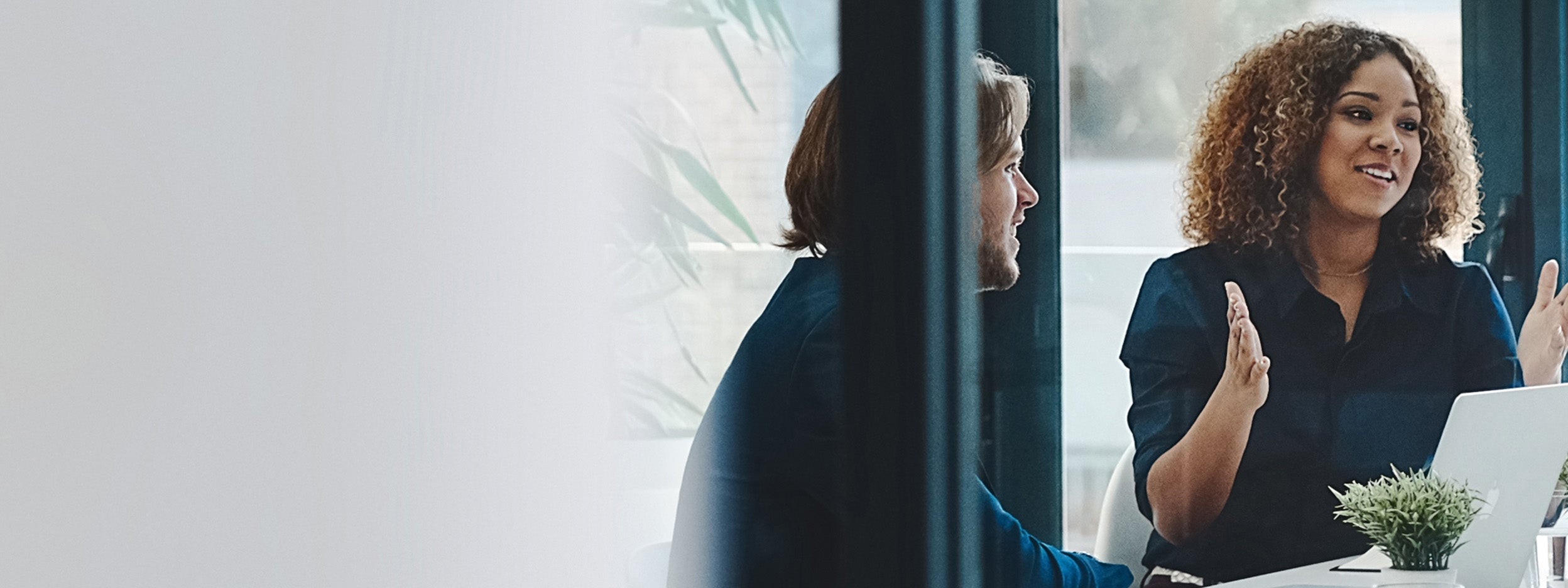 Woman having a discussion with her team