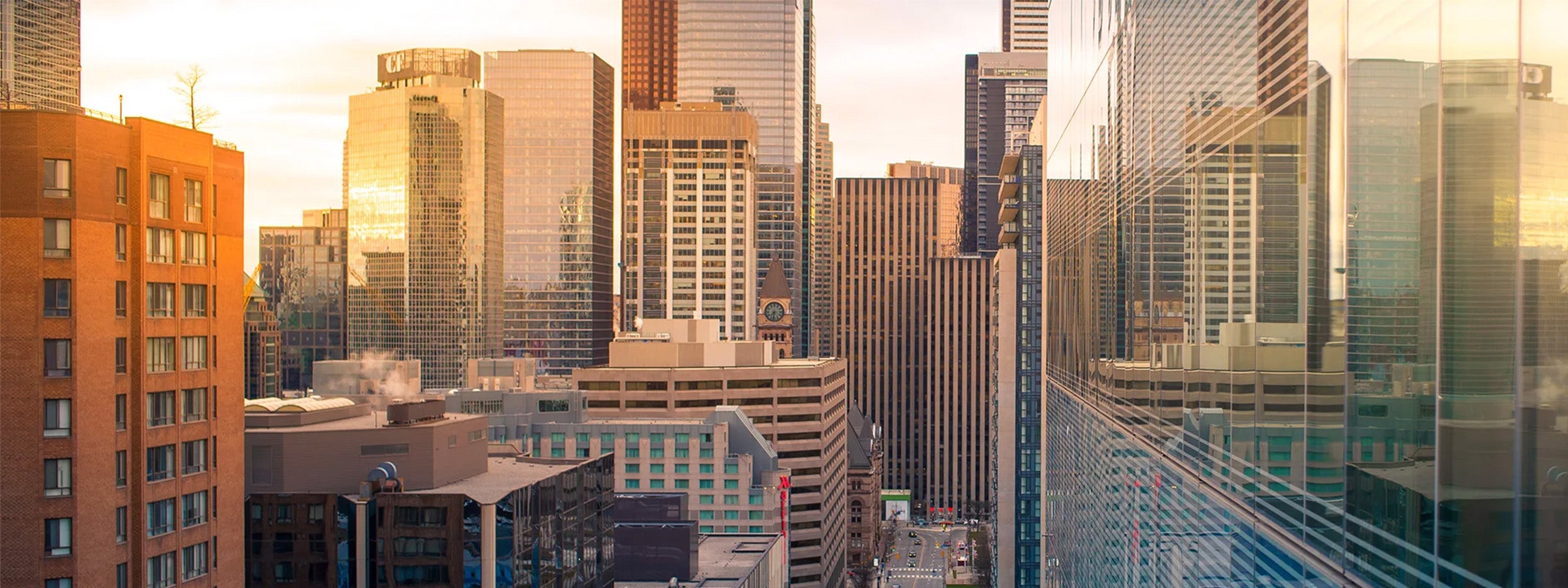 view of city buildings at dusk