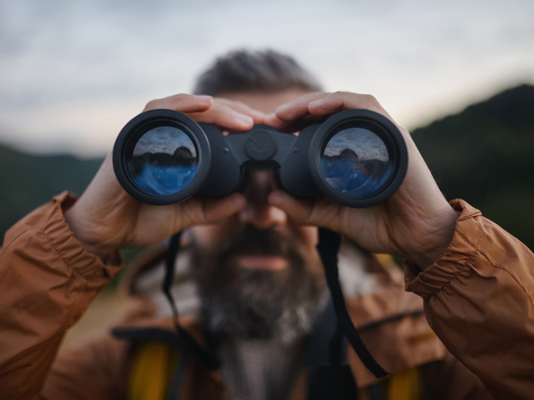 A person looking with binacular