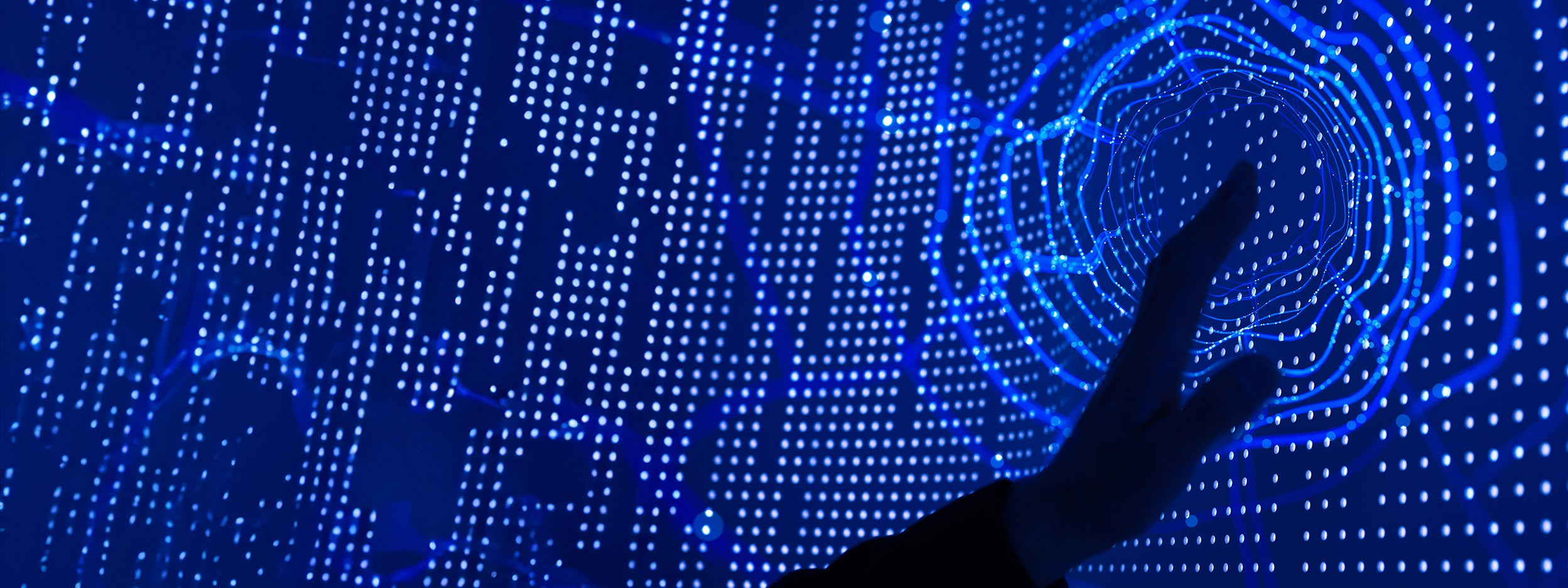 Graphic of hand touching a screen