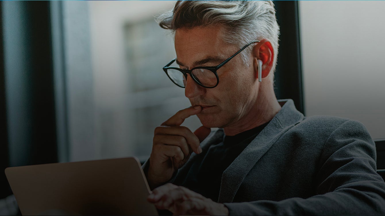 Person looking at his laptop