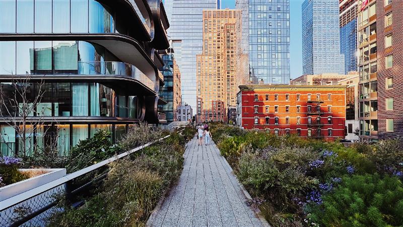 People walking on the High Line path in New York City