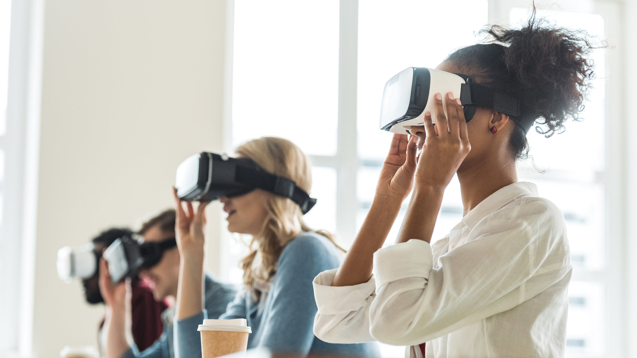 People wearing virtual reality headsets while participating in an interactive training