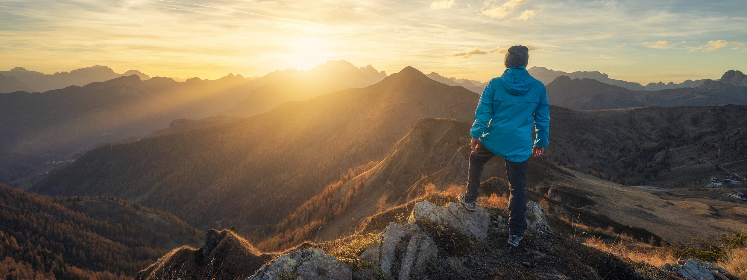 Man at the top of the mountain