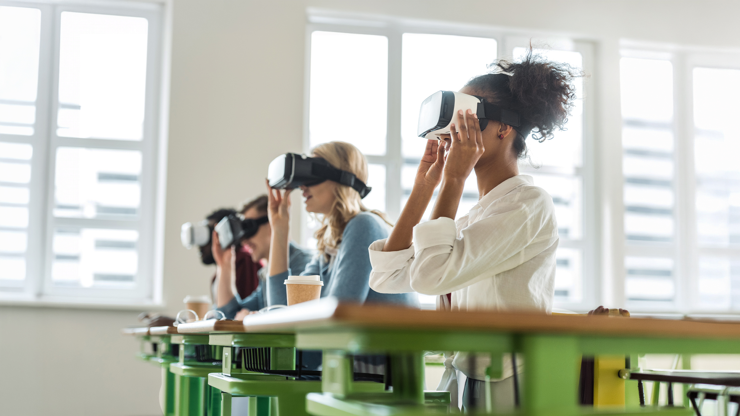People using virtual reality headsets